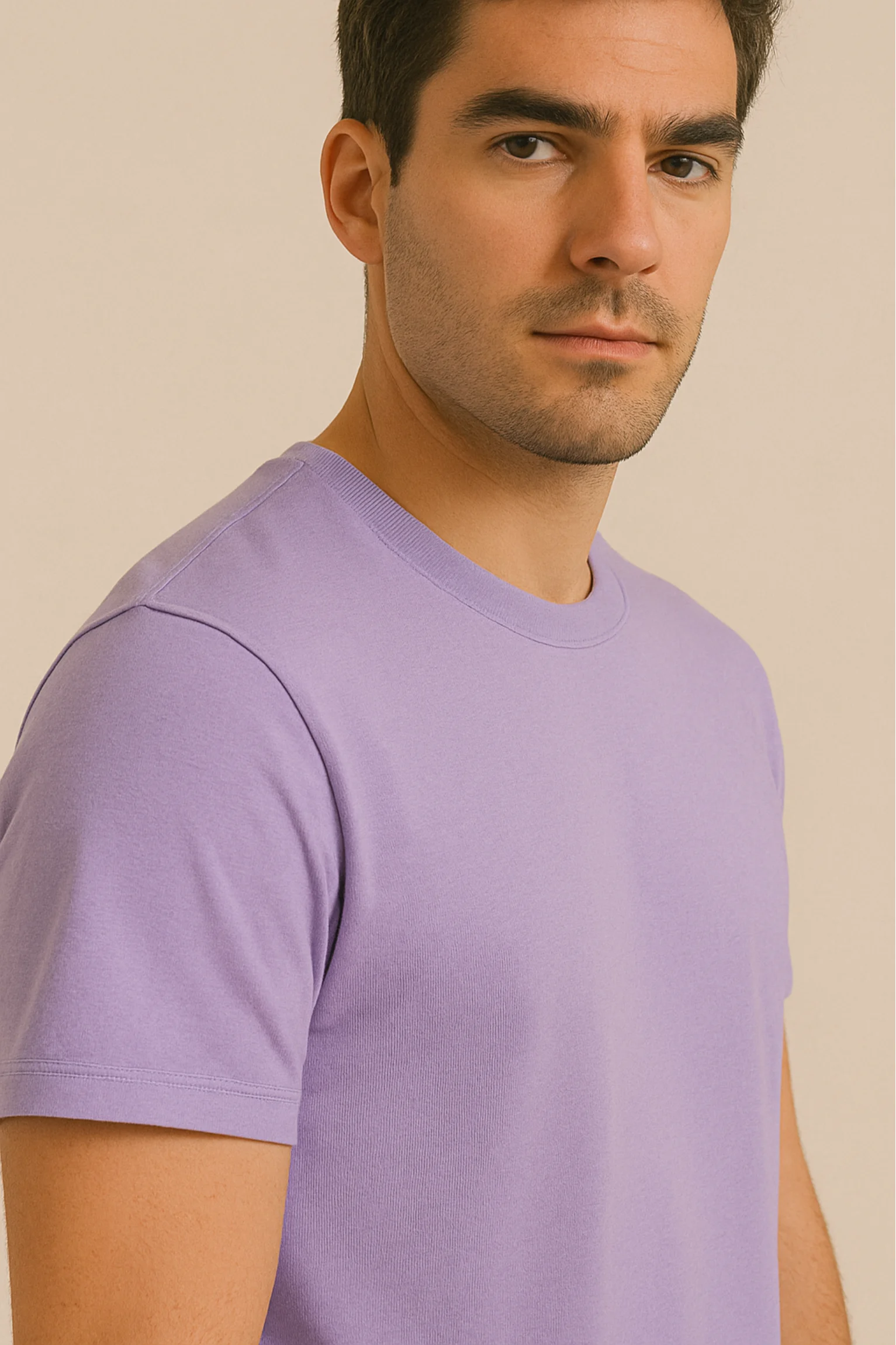 Resillie8 Lavender Men’s Regular Fit T-shirt displayed front-facing on a model. The t-shirt features a soft cotton-polyester blend fabric with a smooth finish, ribbed crew neckline, short sleeves, and a straight-cut hem. Designed for comfort and everyday wear with a modern, minimalist look in a calming lavender shade.