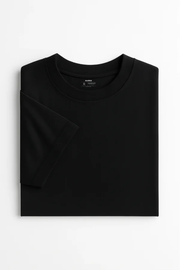 Resillie8 Black Women Oversized T-shirt featuring a relaxed fit, dropped shoulders, ribbed neckline, and straight-cut hem, made from a soft cotton-polyester blend for all-day comfort and effortless style.