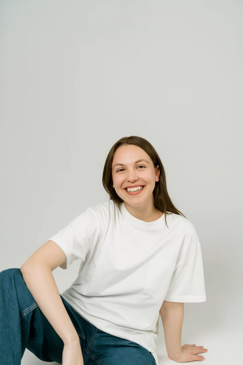 Resillie8 White Women’s Oversized T-Shirt featuring soft cotton-polyester fabric, relaxed dropped shoulders, ribbed crew neckline, and straight-cut hem—designed for breathable comfort and casual-chic style.
