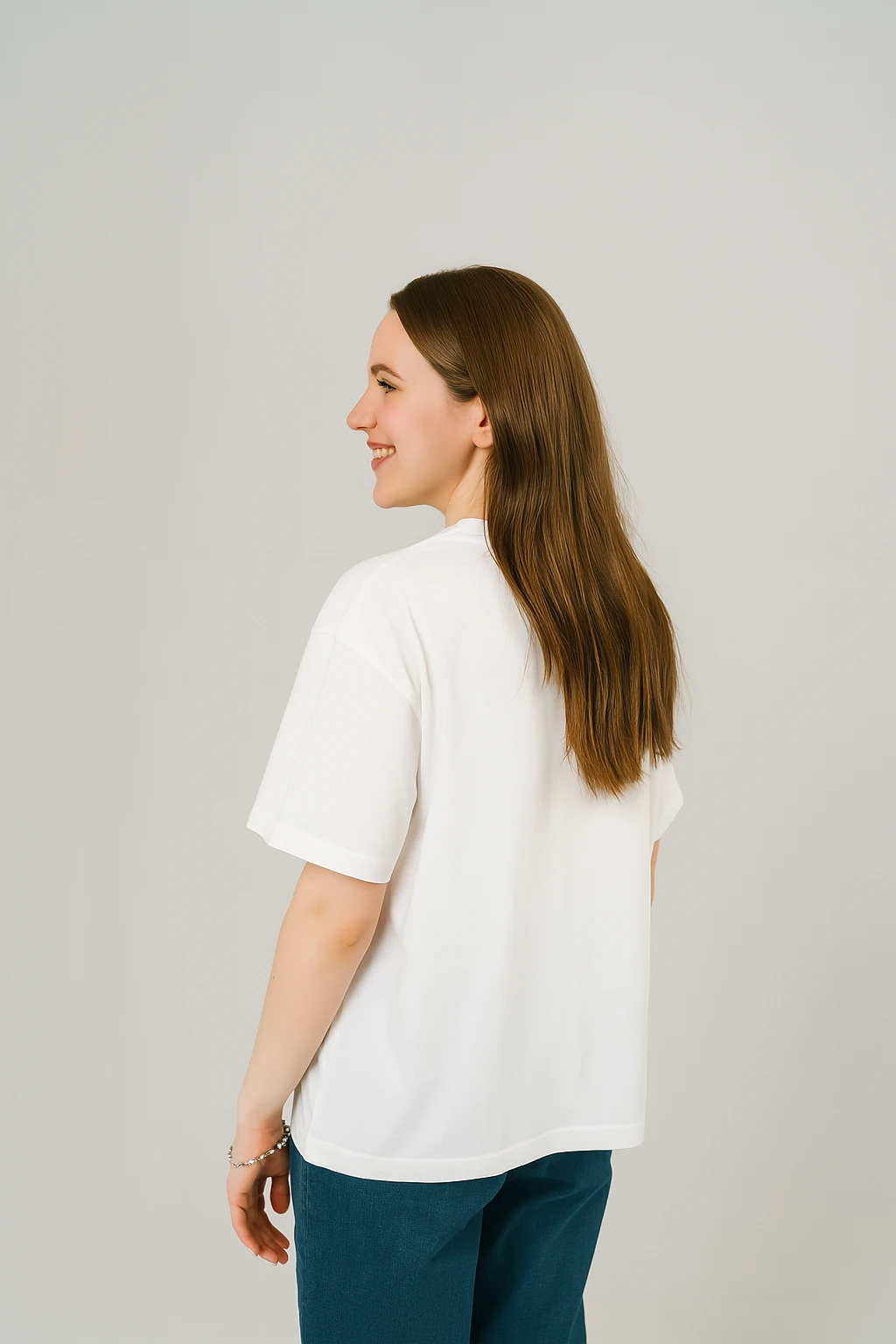 Resillie8 White Women’s Oversized T-Shirt featuring soft cotton-polyester fabric, relaxed dropped shoulders, ribbed crew neckline, and straight-cut hem—designed for breathable comfort and casual-chic style.