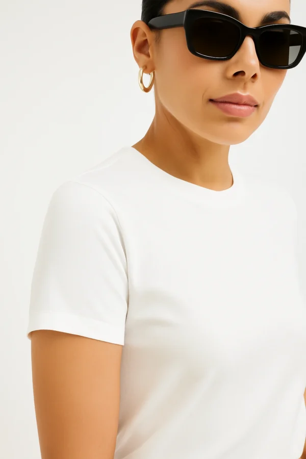 Resillie8 White Women’s Regular Fit T-Shirt featuring a soft cotton-polyester blend, ribbed neckline, and straight-cut hem, offering a breathable, timeless design for everyday comfort and style.