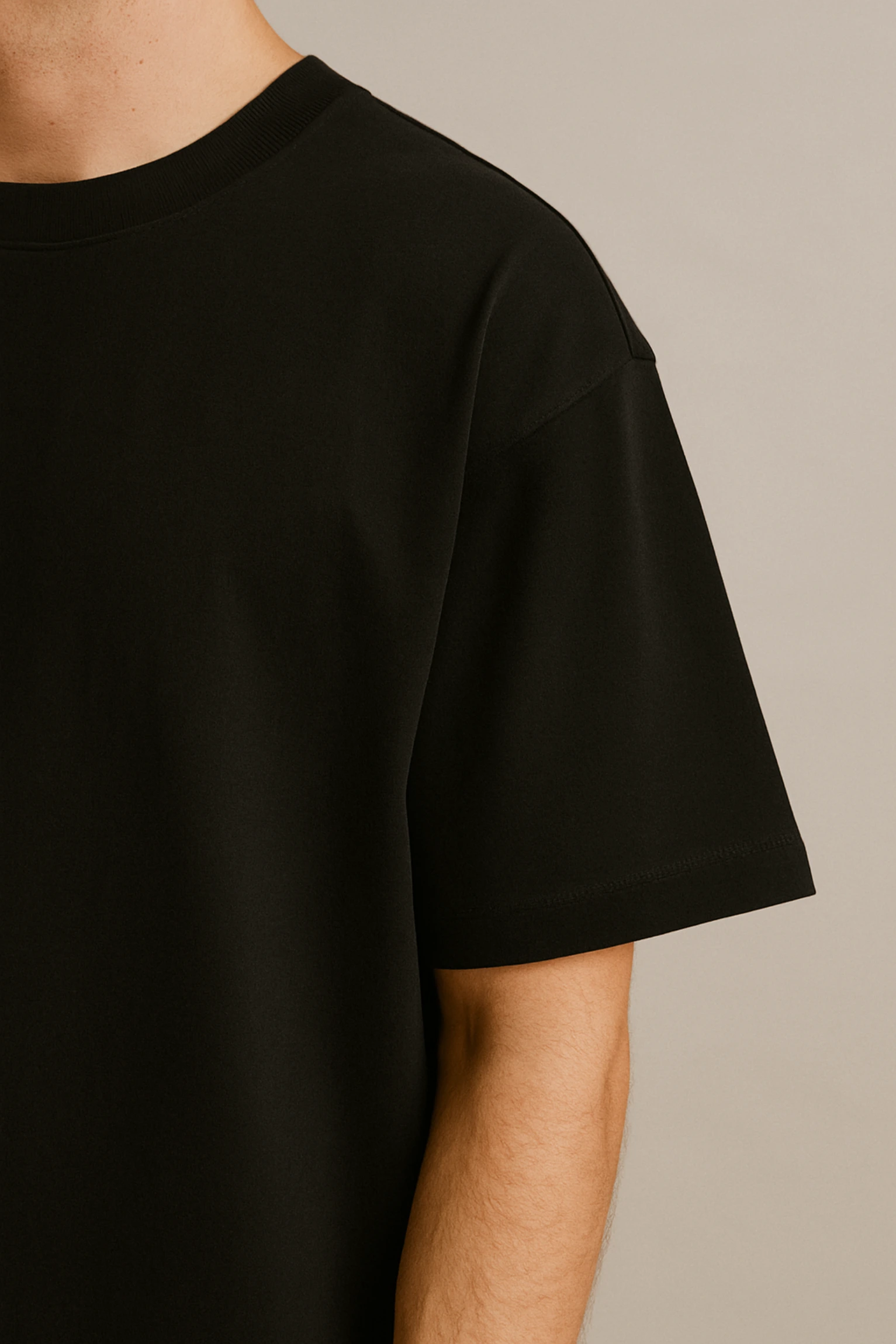 Resillie8 Black men Oversized T-shirt featuring a relaxed fit, dropped shoulders, ribbed neckline, and straight-cut hem, made from a soft cotton-polyester blend for all-day comfort and effortless style.