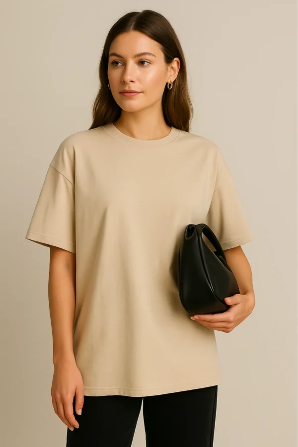Resillie8 White Women’s Oversized T-shirt featuring a relaxed fit with dropped shoulders, ribbed neckline, and straight-cut hem, made from a soft cotton-polyester blend for breathable comfort and casual style.