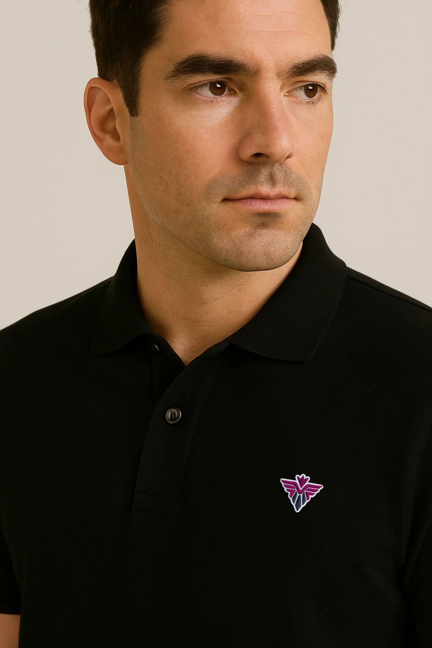 Black polo t-shirt made from premium cotton blend double piqué fabric with short sleeves, buttoned collar, and regular fit