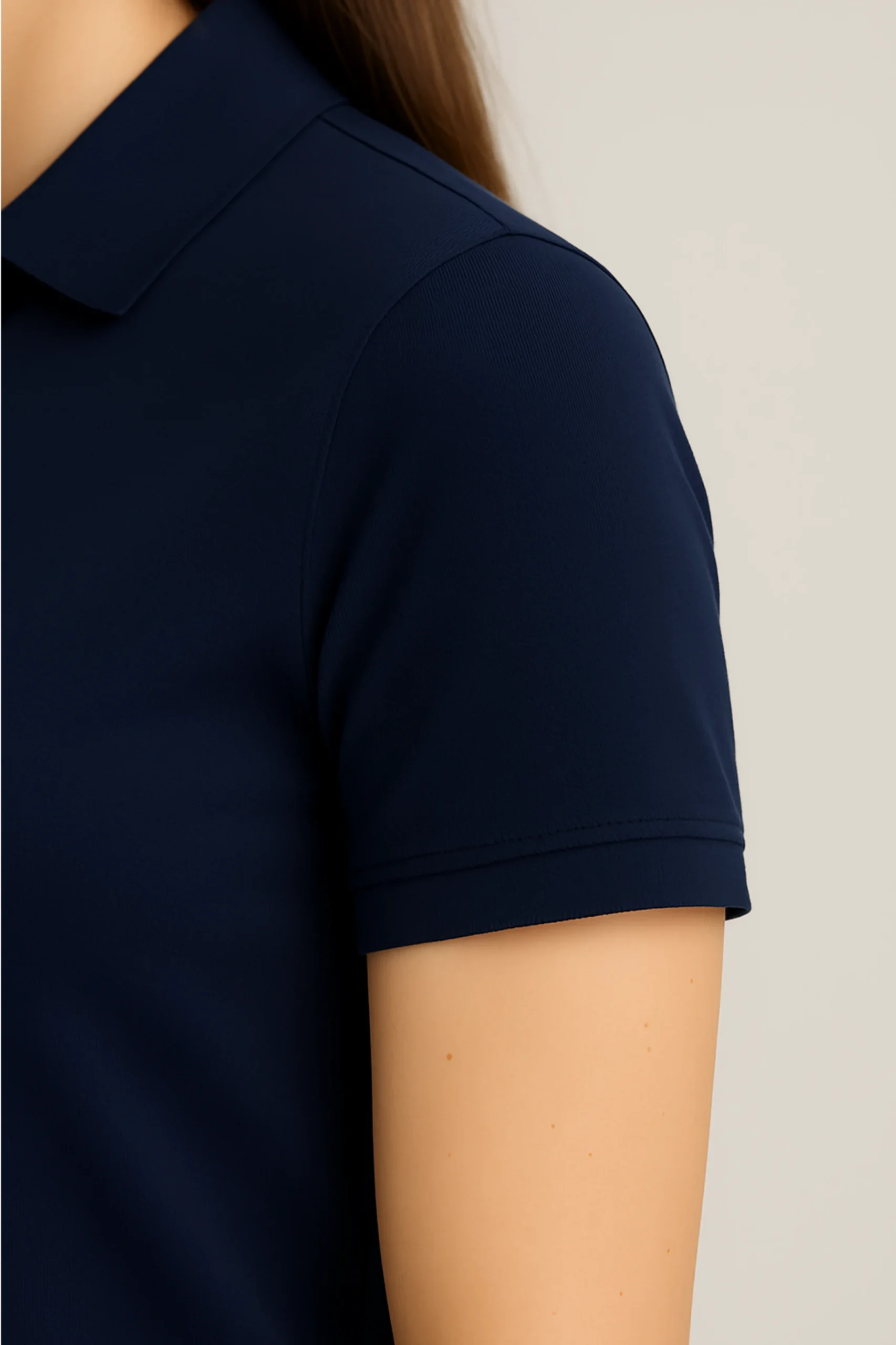Navy blue polo t-shirt made from premium cotton blend double piqué fabric with short sleeves, buttoned collar, and classic regular fit