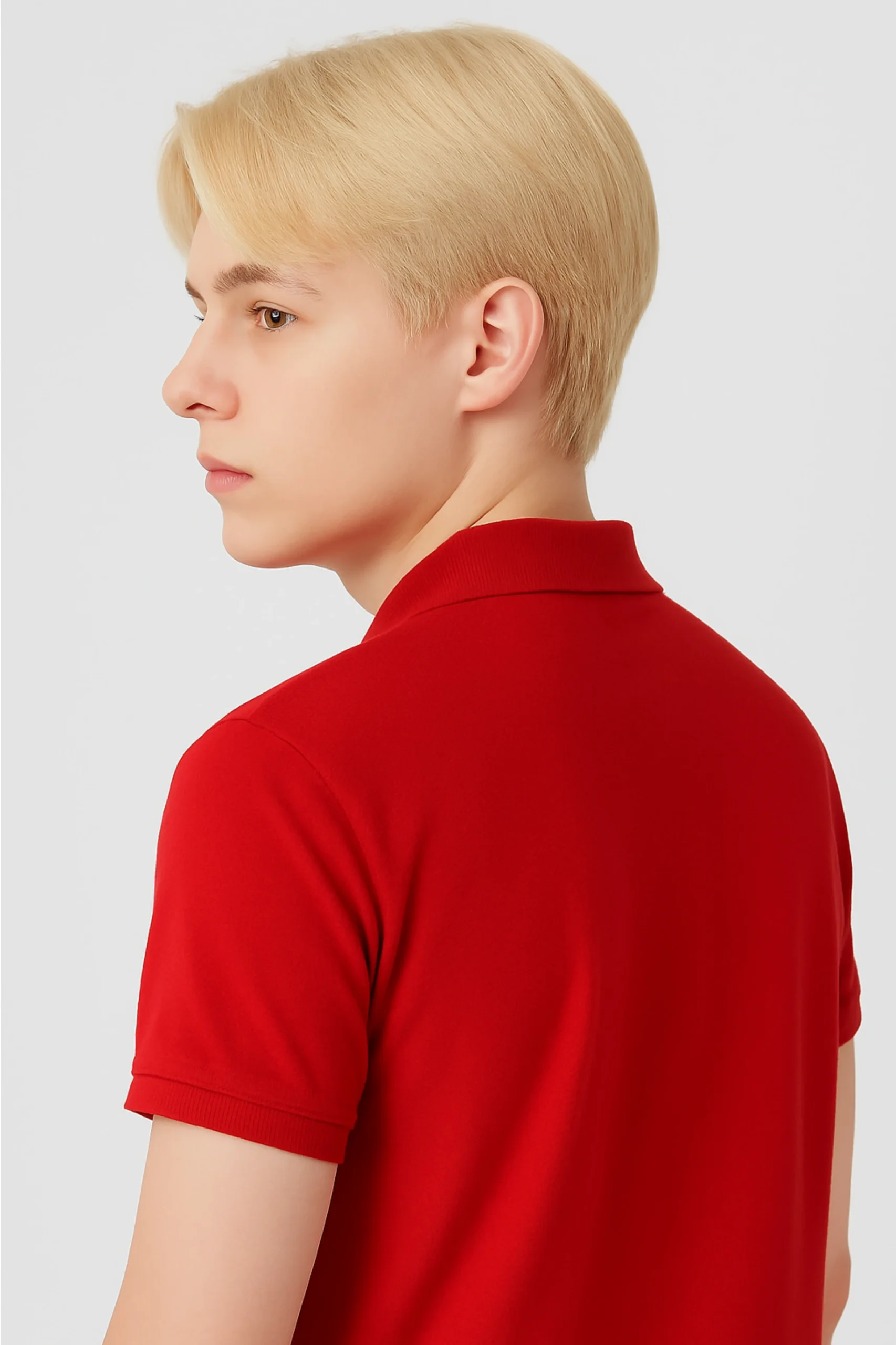 Red men’s polo t-shirt made from soft cotton blend fabric, featuring short sleeves, buttoned collar, and a classic regular fit.