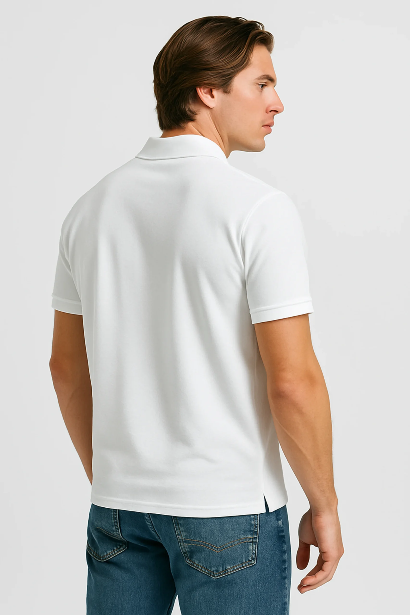White polo t-shirt crafted from premium cotton blend double piqué fabric with short sleeves, buttoned collar, and classic regular fit