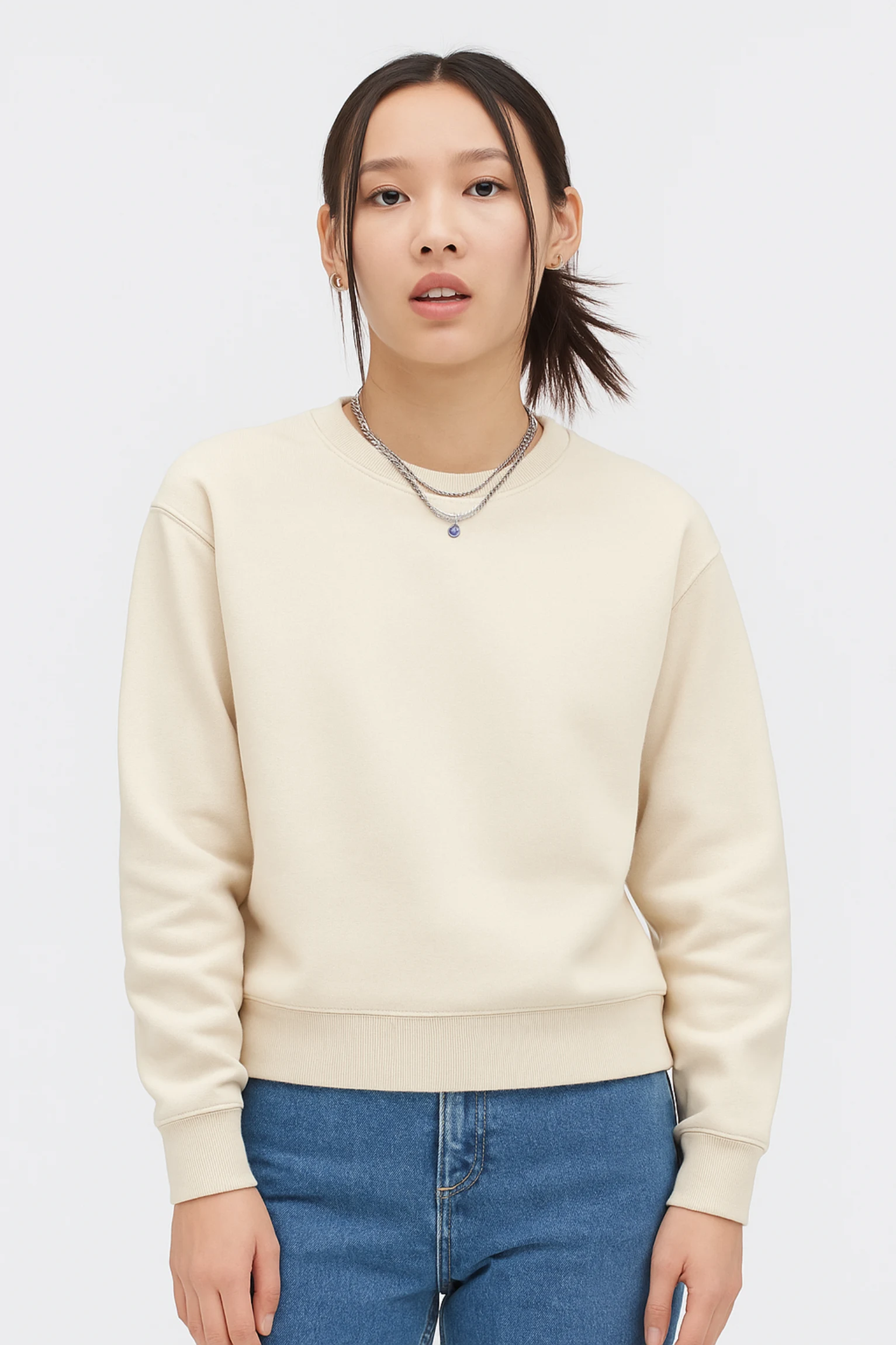 Beige sweatshirt made from premium poly-cotton fleece fabric with long sleeves, soft brushed interior, and classic regular fit