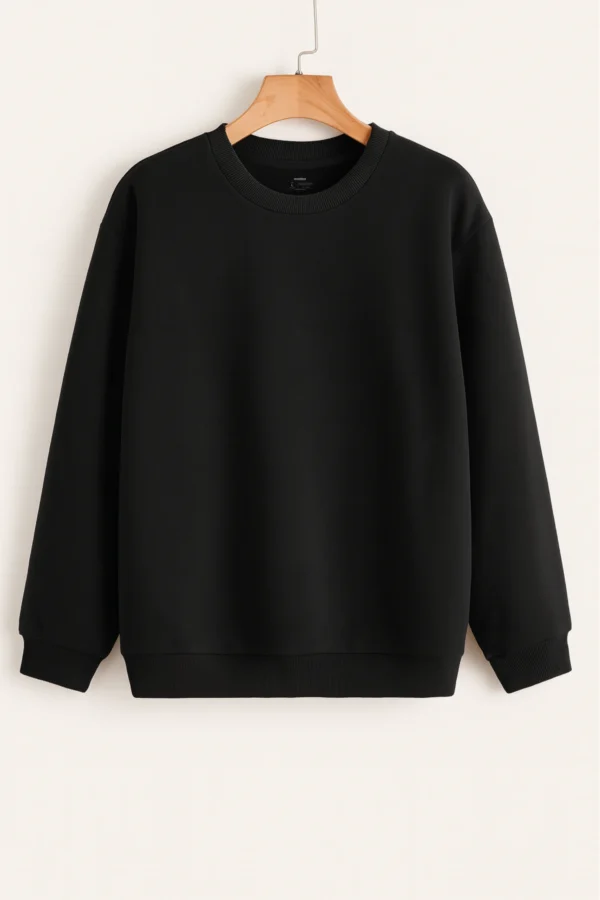 Black sweatshirt-style polo t-shirt crafted from premium cotton blend fabric with long sleeves, buttoned collar, and regular fit.