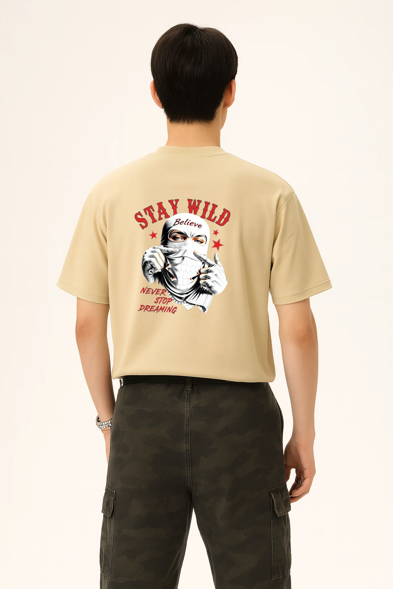 Stay Wild oversized t-shirt made from premium 240 GSM French Terry fabric, 52% cotton and 48% polyester blend, with bold graphic and relaxed fit