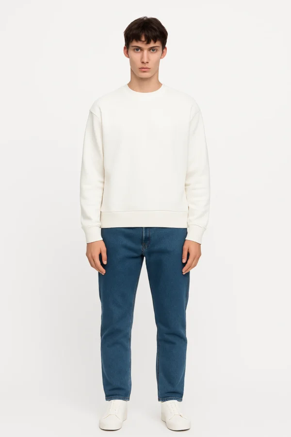 White sweatshirt crafted from premium poly-cotton 3-thread fleece fabric with long sleeves, soft brushed interior, and regular fit