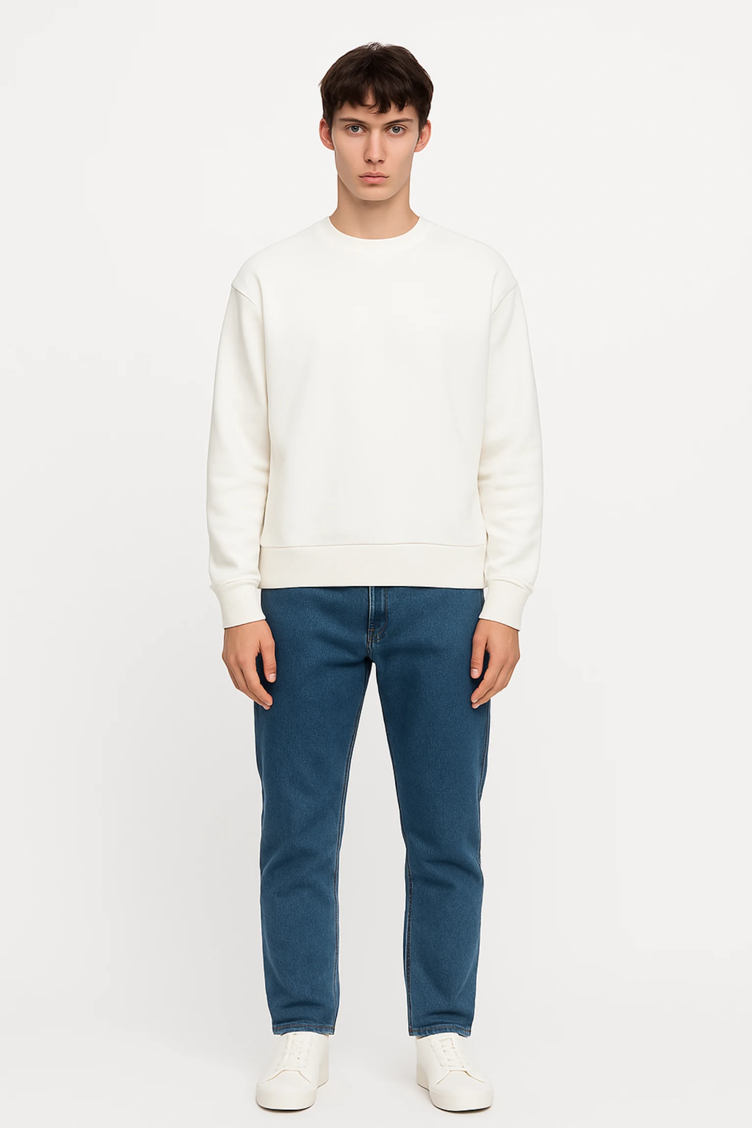 White sweatshirt crafted from premium poly-cotton 3-thread fleece fabric with long sleeves, soft brushed interior, and regular fit