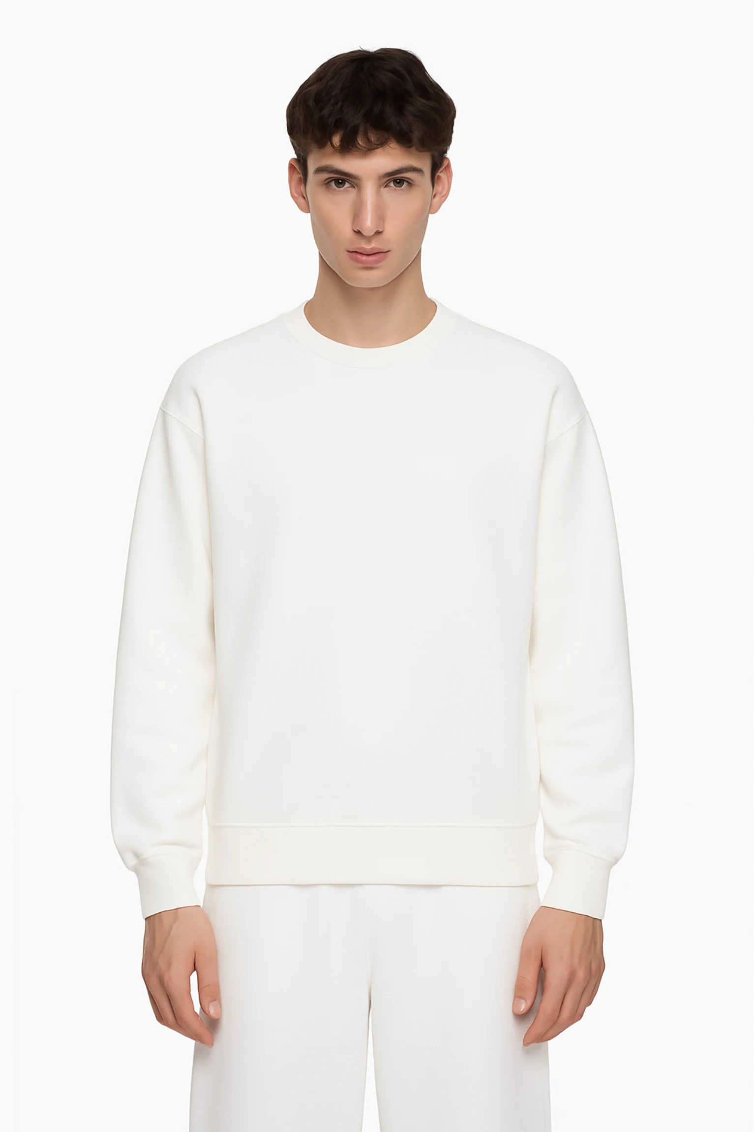 White sweatshirt crafted from premium poly-cotton 3-thread fleece fabric with long sleeves, soft brushed interior, and regular fit